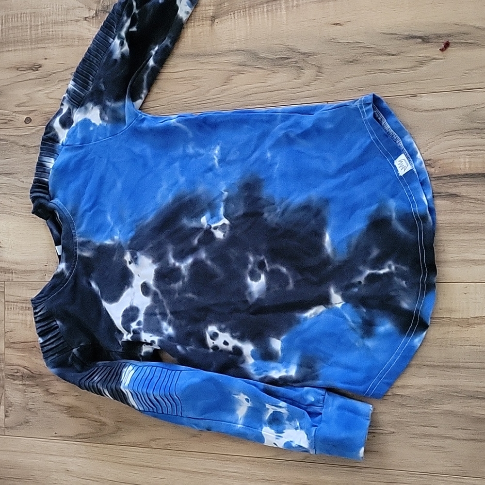 Small shop, size 6, Black blue and white long sleeve shirt.